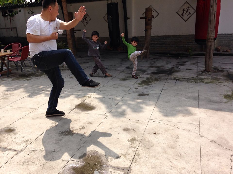 a Kung Fu master teaching little kids