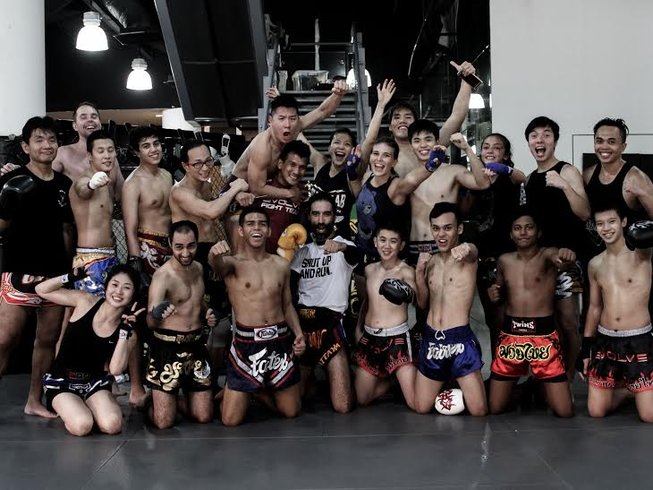 trainers and trainees at Evolve MMA
